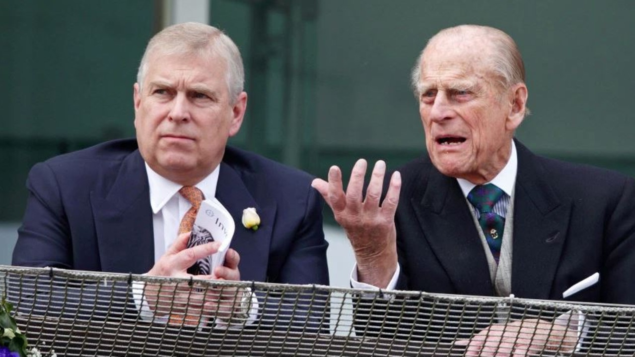 Prince Andrew with Prince Philip.