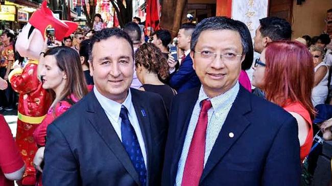 Staffer John Zhang, right, was implicated in the raids targeting Labor MP Shaoquett Moselmane, left.