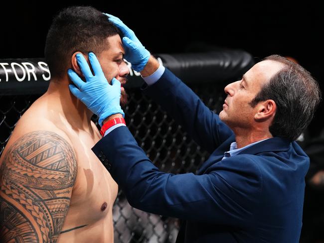 Justin Tafa was less than impressed that the cageside doctor wanted him to fight on. Picture: Josh Hedges/Zuffa LLC