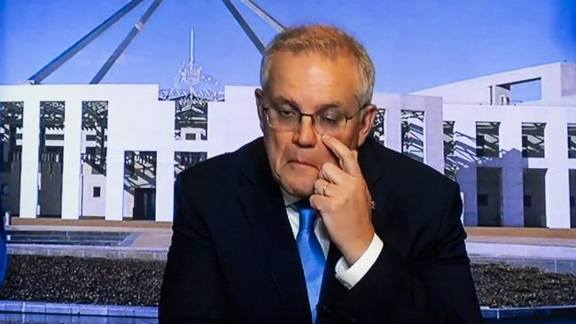 Prime Minister Scott Morrison beams into Question Time at Parliament House in Canberra last week while isolating. Picture: NCA NewsWire / Martin Ollman