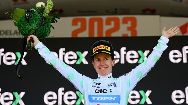 Spratt celebrates at podium as Queen of the Mountain Jersey during the 7th Santos Women's Tour Down Under 2023 – Stage 2. Photo by Tim de Waele/Getty Images