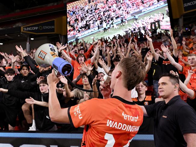 Thomas Waddingham of the Roar celebrates victory with the fans after the A-League Men round 16 match between Brisbane Roar and Melbourne City at Suncorp Stadium Credit: Bradley Kanaris