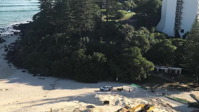 Bulldozers on the beach at Greenmount.