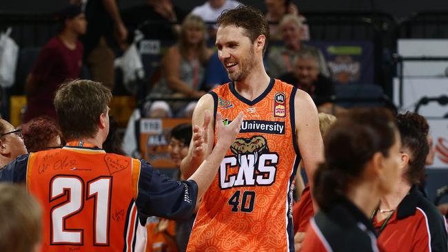                         <s1>TEAM PLAYER: Cairns Taipans captain Alex Loughton shakes hands with Taipans fans after the round 16 National Basketball League (NBL) match between the Snakes and the Adelaide 36ers, held at the Cairns Convention Centre.</s1>                        <ld pattern=" "/>                        <source> Picture: BRENDAN RADKE. </source>                     