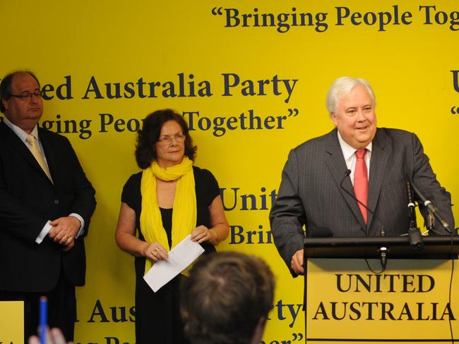 Clive Mensink, left, with Veronica Ford and Clive Palmer during the announcement of his political candidacy.