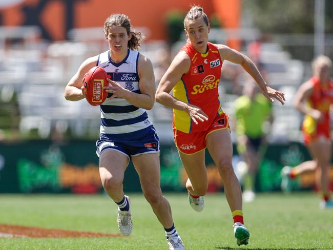 Geelong’s Nina Morrison breaks away from her opponent during Saturday’s win over Gold Coast. Picture: Russell Freeman/AFL Photos via Getty Images