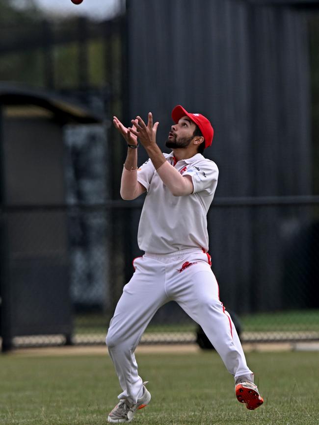 VSDCA: Melton’s Stephen Wiig completes the catch. Picture: Andy Brownbill