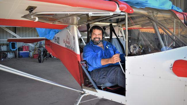 Airlie Beach resident Ivan Lizarralde with his plane under the hangar at Lakeside Airfield, Whitsunday Park Estate, Bloomsbury. Picture: Heidi Petith