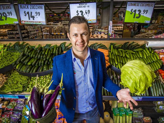 Harris Farm Markets. Tristan Harris, owner of Harris Farm Markets, at the grocer for a follow up story on the rising cost of fresh produce, particularly lettuce. * Tristan with expensive lettuce and also egg plant which has reduced in price.Picture: NIGEL HALLETT