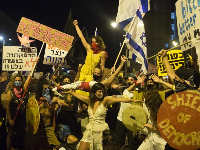 JERUSALEM, ISRAEL - AUGUST 01:  Israeli protesters pose for a photo during a demonstration against Israeli Prime Minister Benjamin Netanyahu on August 1, 2020 in Jerusalem, Israel. The protests have become a recurring feature amid discontent over the the government's handling of the coronavirus pandemic and Netanyahu's looming corruption trial.  (Photo by Amir Levy/Getty Images) *** BESTPIX ***