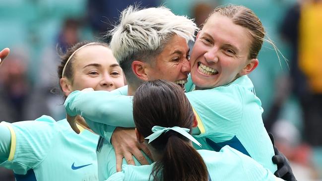 TASHKENT, UZBEKISTAN - FEBRUARY 24: Michelle Heyman of Australia celebrates scoring her team's second goal with teammates  during the AFC Women's Paris 2024 Olympic Qualifier Round 3 match between Uzbekistan and Australia Matildas at Milliy Stadium on February 24, 2024 in Tashkent, Uzbekistan. (Photo by Tolib Kosimov/Getty Images)