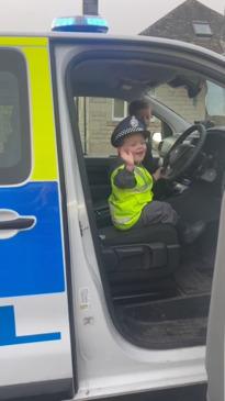 Two young boys get a very special surprise visit from the police