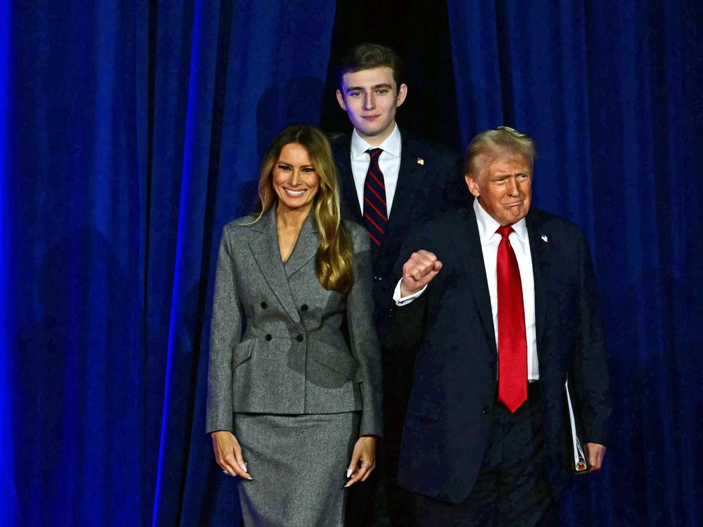 Donald and Melania trump with their son Barron.. (Photo by Jim WATSON / AFP)