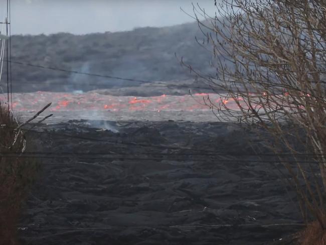 Lava gushes through Leilani Estates from Kilauea volcano's Fissure 8. Picture: Anthony Quintano/Honolulu Civil Beat via Storyful