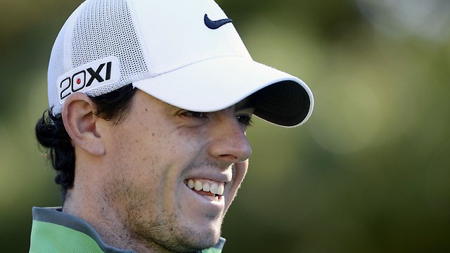 Rory Mcilroy of Northern Ireland smiles on the course during the Pro-Am competition of the Kolon Korea Open at Woo Jeong Hills Country Club.