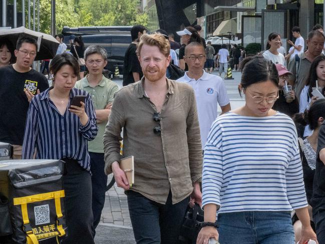 Beijing August 21st 2023Will Glasgow posing for a portrait on a street of Sanlitun.Gilles Sabrie for The Australian