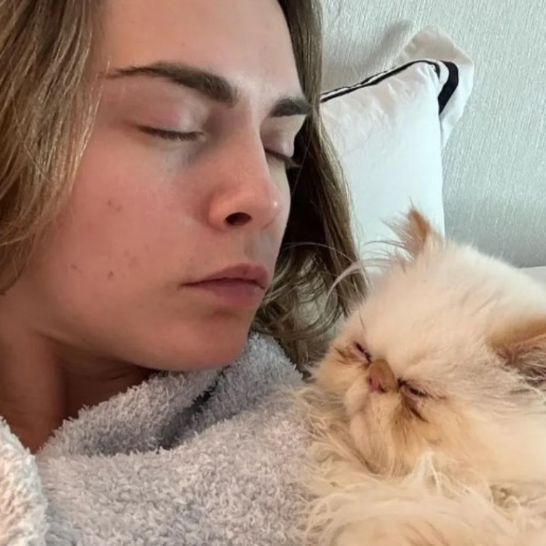 Cara with one of her beloved felines. (Picture: Cara Delevingne/Instagram)