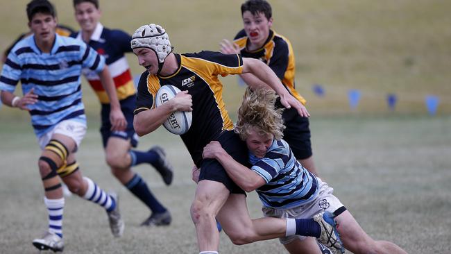 ISA I's Riley Langfield tackled by GPS I's Jullien Cailloli.