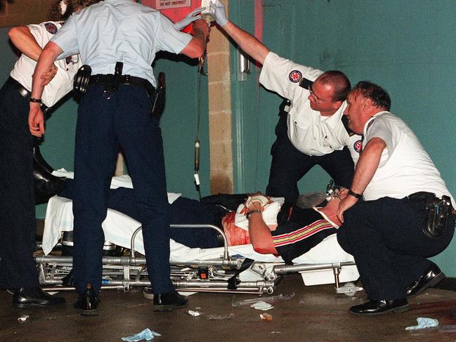 Jason Semple is attended to after being stabbed on a Sydney street in 1998.