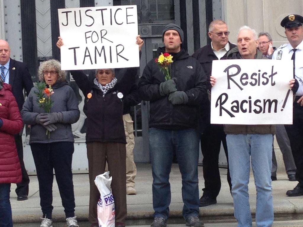 Mr Gugino, holding a ‘Resist Racism’ sign in 2014, is a longtime activist. Picture: Mark Colville/AP