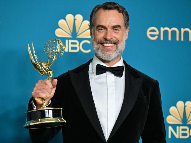 Australian actor Murray Bartlett poses with the Emmy for Outstanding Supporting Actor In A Limited Or Anthology Series Or Movie for "The White Lotus" during the 74th Emmy Awards at the Microsoft Theater in Los Angeles, California, on September 12, 2022. (Photo by Frederic J. Brown / AFP)