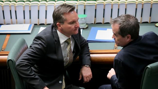 Cuts slammed ... Shadow Treasurer Chris Bowen and Opposition Leader Bill Shorten chat  during Question Time.