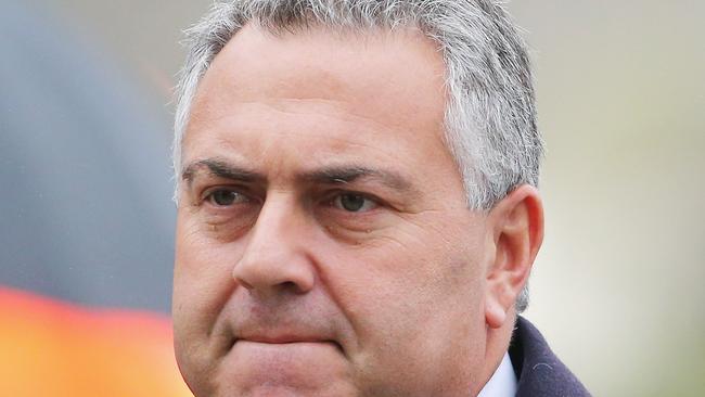 MELBOURNE, AUSTRALIA - AUGUST 07: Australian Treasurer Joe Hockey arrives to attend a national memorial service as Australians mourn the loss of all victims of Malaysia Airlines Flight MH17 at St. Patrick's Cathedral on August 7, 2014 in Melbourne, Australia. The Government has declared Thursday 7 August 2014 to be a National Day of Mourning. (Photo by Scott Barbour/Getty Images)