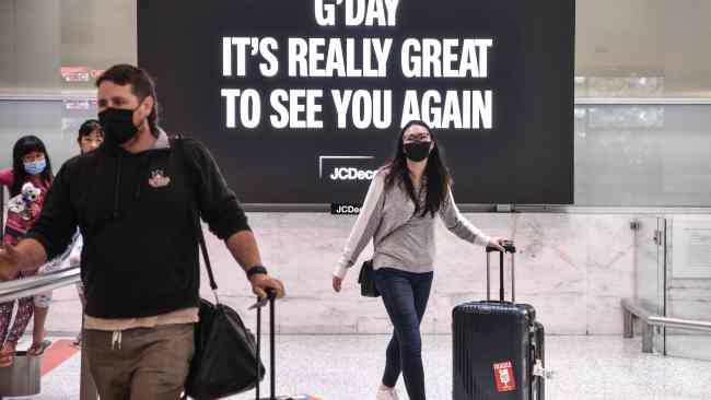 Travellers arrive in Sydney from Singapore on Sunday. Picture: NCA NewsWire / Flavio Brancaleone
