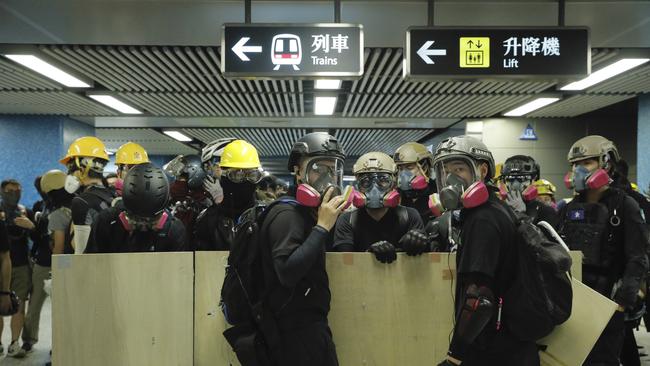 Beijing will never lose face by compromising with protesters. Picture: AP/Kin Cheung