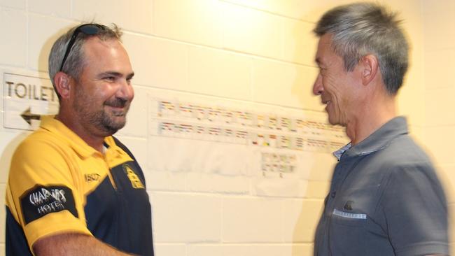 Alastair Lewis congratulates Gary Young on winning the Sauer Family Trophy for Volunteer of the year. Picture: Supplied