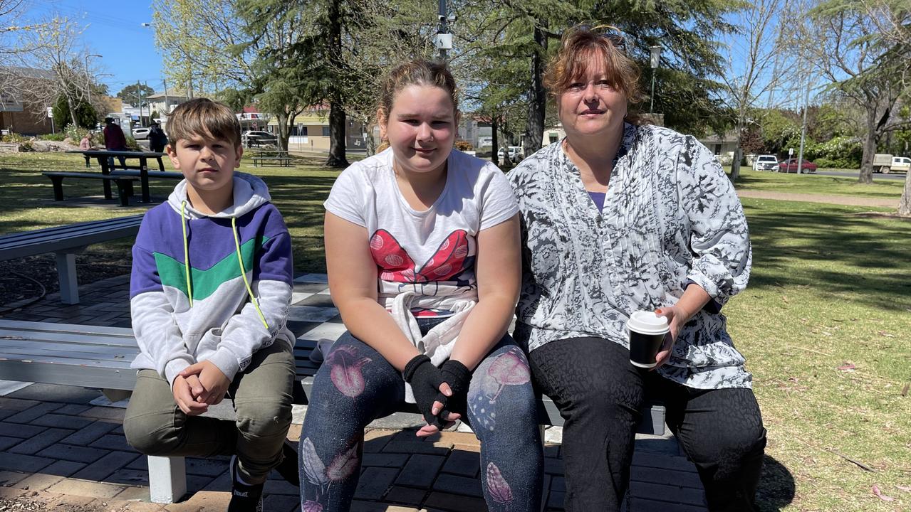 Marea Caterer and her grandchildren Brentley (8) and Sophie Pascoe (10) saw snow for a short time at their home in Thulimbah. Photo: Madison Mifsud-Ure / Stanthorpe Border Post