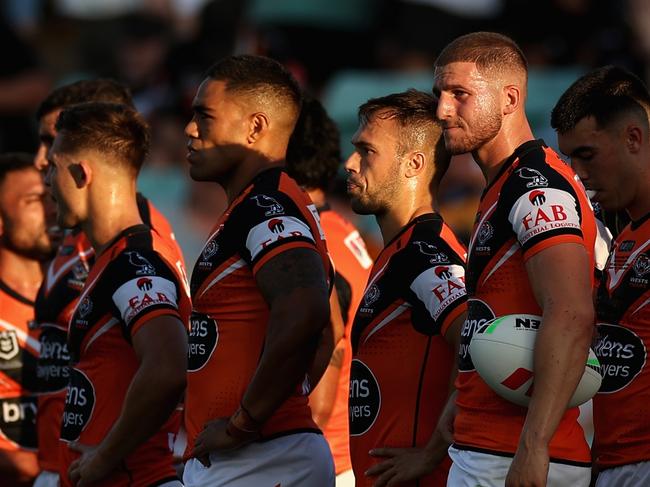 SYDNEY, AUSTRALIA - MARCH 05: Tigers players look on following a Titans try during the round one NRL match between the Wests Tigers and the Gold Coast Titans at Leichhardt Oval on March 05, 2023 in Sydney, Australia. (Photo by Cameron Spencer/Getty Images)