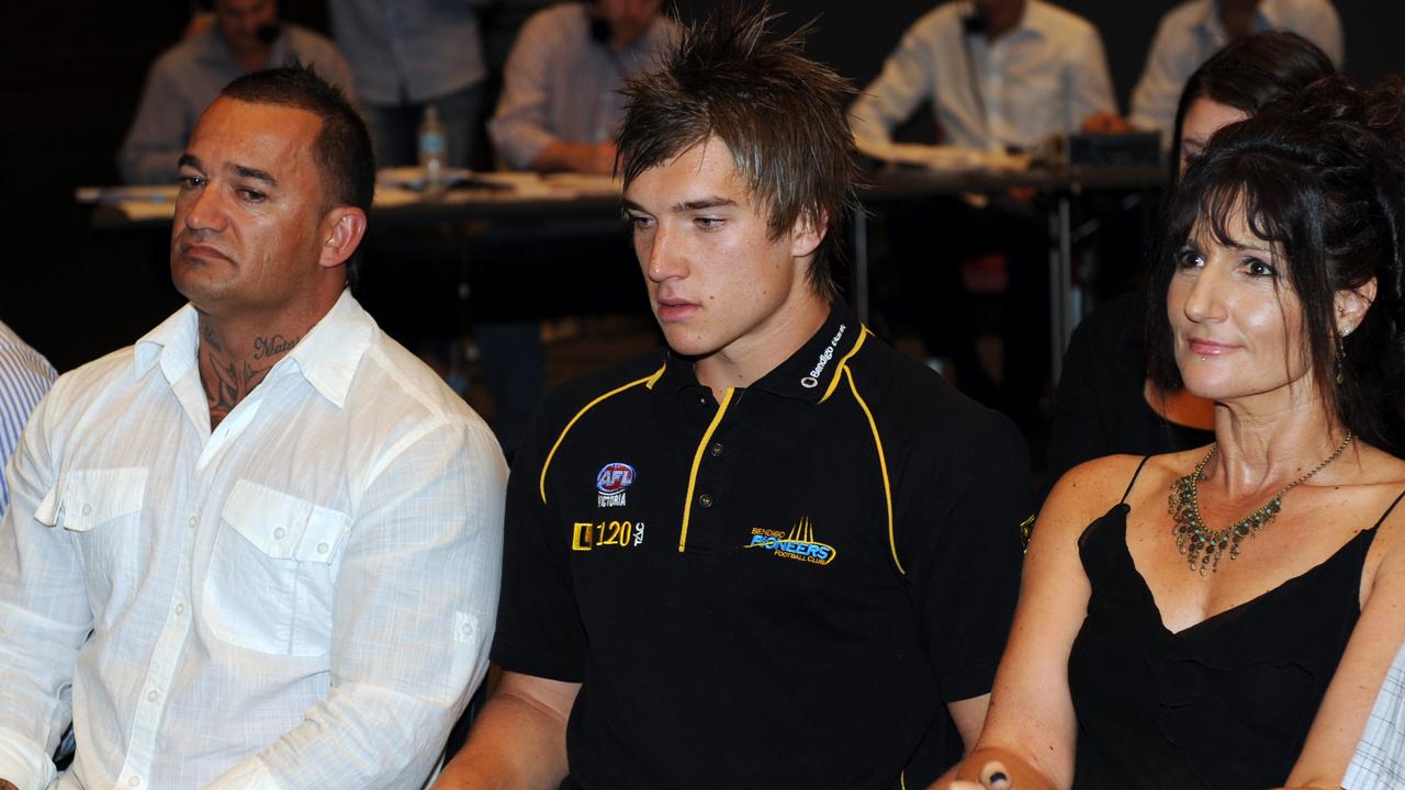 Dustin Martin with dad Shane and mum Kathy Knight on the night he was drafted in 2009.