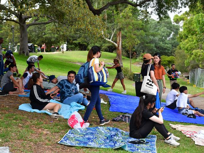 People are seen setting up at Mrs Macquarie's Point in preparation for New Years Eve Fireworks in Sydney, Monday, December 31, 2018. Picture: AAP / Brendan Esposito