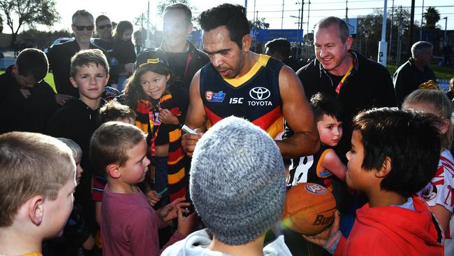 Adelaide star Eddie Betts was swamped by fans after his debut appearance in the SANFL. Picture: Mark Brake/Getty Images