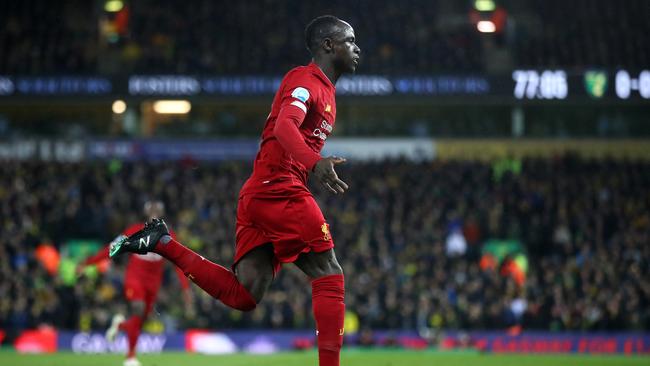 NORWICH, ENGLAND - FEBRUARY 15: Sadio Mane of Liverpool celebrates after scoring his team's first goal during the Premier League match between Norwich City and Liverpool FC at Carrow Road on February 15, 2020 in Norwich, United Kingdom. (Photo by Julian Finney/Getty Images)