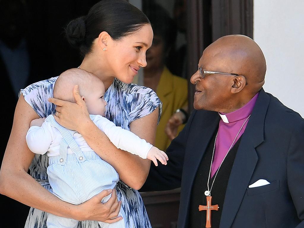 Meghan and Archie meeting Desmond Tutu. Picture: Toby Melville — Pool/Getty Images