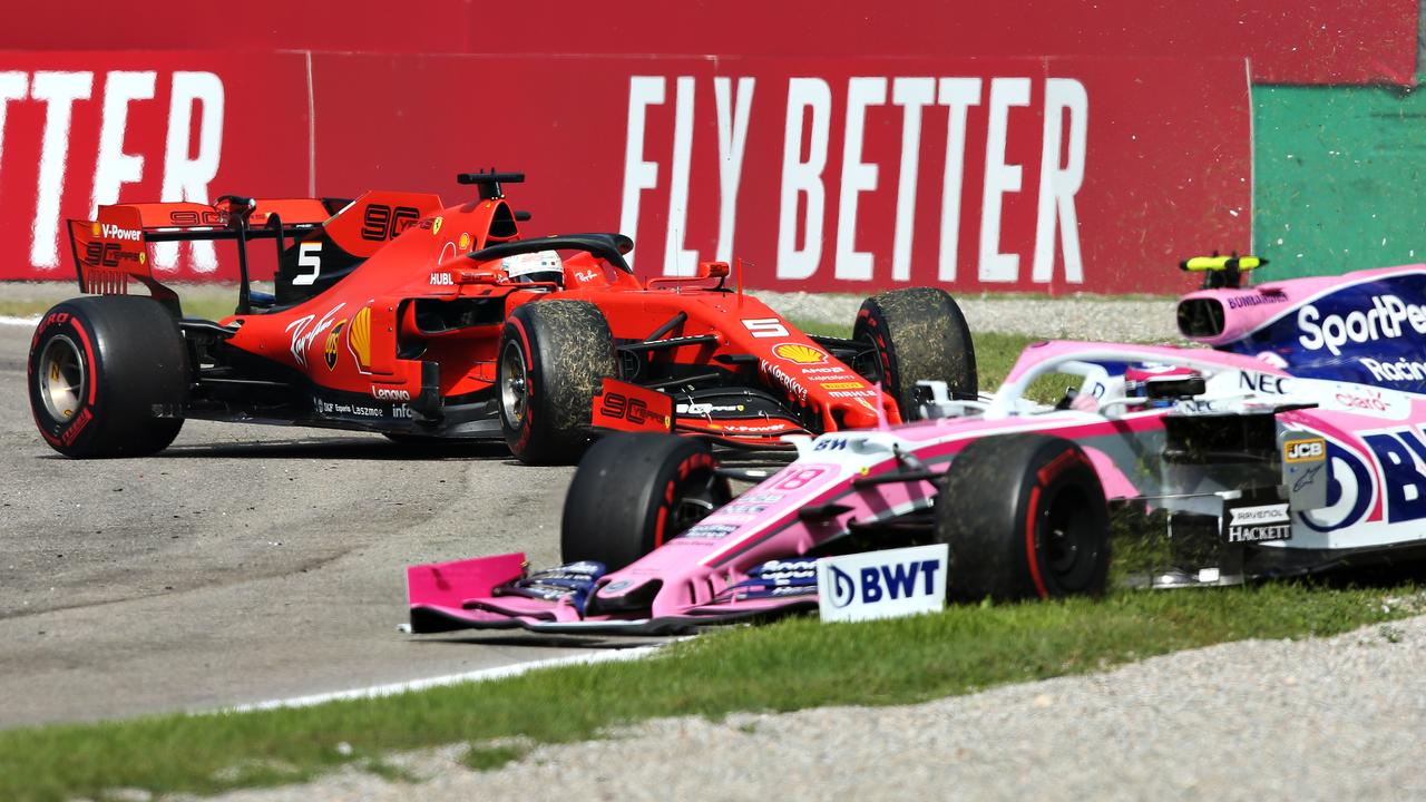 Lance Stroll spins after being clipped by Sebastian Vettel early in the race.