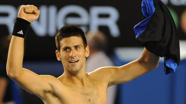 Novak Djokovic celebrates winning over top seed Roger Federer in their semi-finals match against at the Australian Open in 2008. Djokovic won the match 7-5, 6-3, 7-6. Picture: AAP