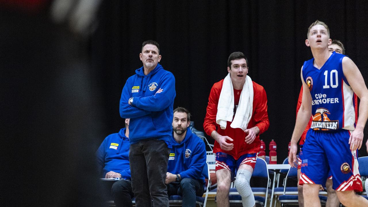 Toowoomba Mountaineers coach Darryl Allen (left) and bench react during the game against Rip City in Queensland State League Division 1 mens basketball semi-final at USQ's Clive Berghofer Recreation Center, Saturday, July 30, 2022. Picture: Kevin Farmer