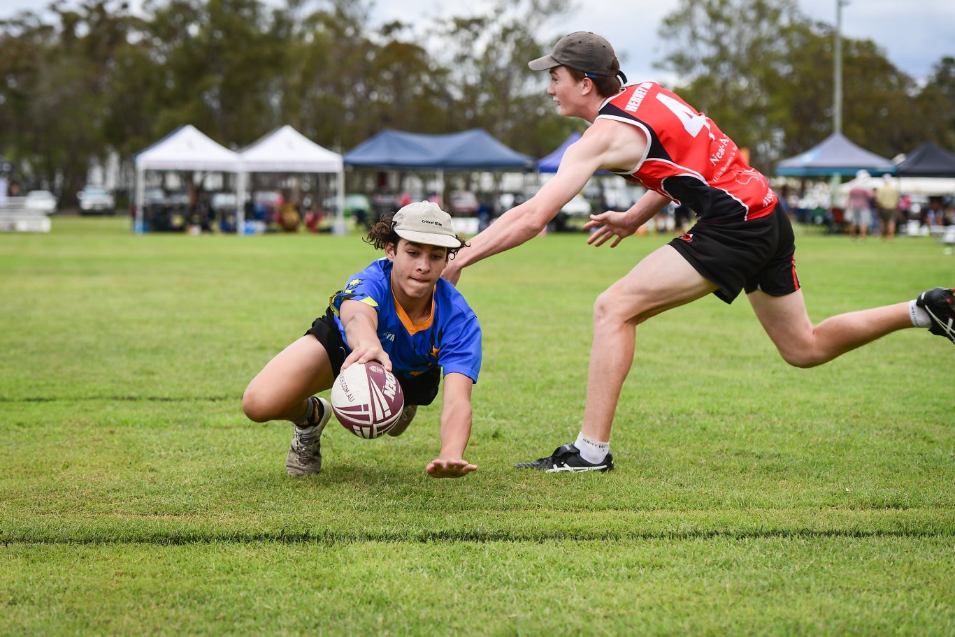 Tulloch McClellan reaches for the line to score for Gympie.