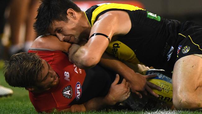 Trent Cotchin got up close and personal with Jack Viney during last year’s Anzac Eve clash.