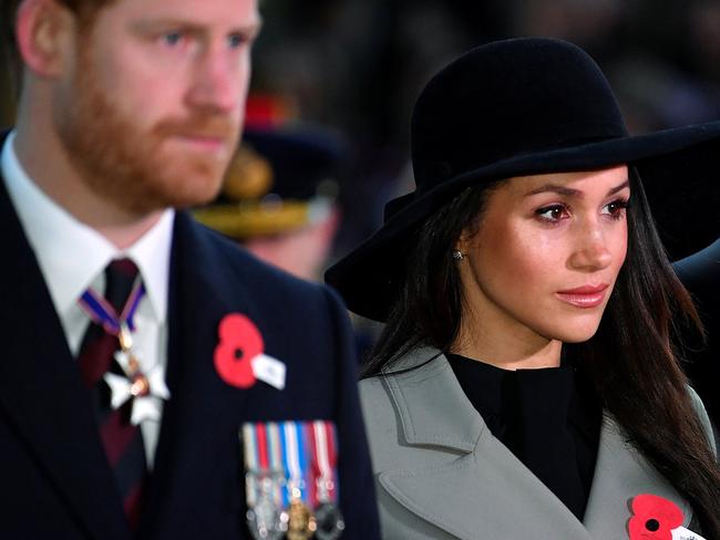 Prince Harry and his fiancee Meghan Markle attend an Anzac Day dawn service at Hyde Park Corner in London. Picture: AFP/Pool/Toby Melville