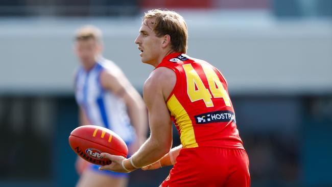 A swap to defence helped make Darcy Macpherson a mainstay in the AFL side once again. Picture: Getty Images