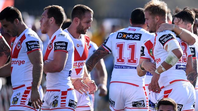 Jack De Belin celebrates a try with his Dragons teammates.