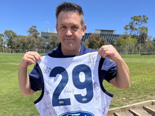 American Geelong fan Anthony George at the Cats' final training of 2024 with the number 29 on the back.