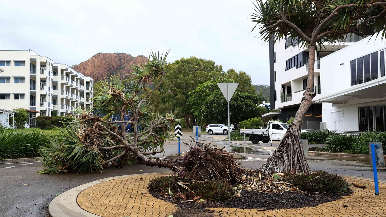Townsville locals woke early to inspect the damage along The Strand left from TC Kirrily that hit overnight. Picture: Adam Head