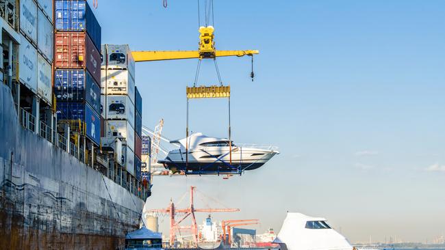 One of seven Riviera luxury motor yachts loaded onto a container ship. PICTURE: Bradley Kanaris