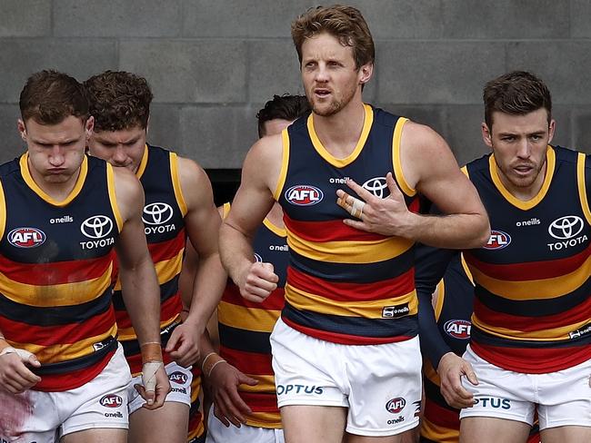 BALLARAT, AUSTRALIA - JULY 31: Rory Sloane of the Crows, Rory Laird of the Crows and Paul Seedsman of the Crows run on to the ground during the 2021 AFL Round 20 match between the Western Bulldogs and the Adelaide Crows at Mars Stadium on July 31, 2021 in Ballarat, Australia. (Photo by Dylan Burns/AFL Photos via Getty Images)