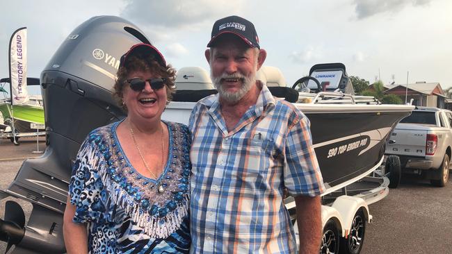 Veronica and Geoff Warham in front of their new boat. Picture: Stewart Zanker